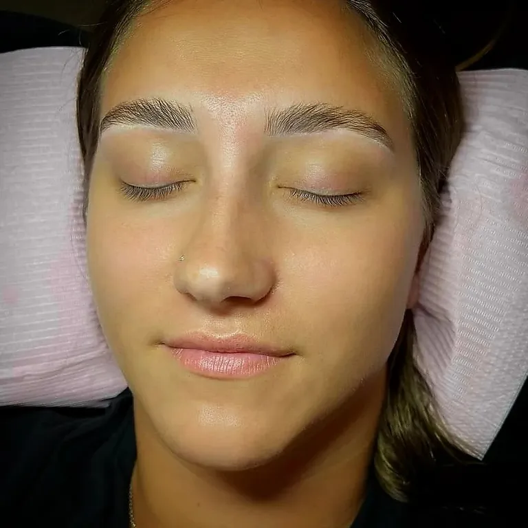 Freshly shaped and tinted brows after a brow service at Dockside Salon in Muskegon, MI