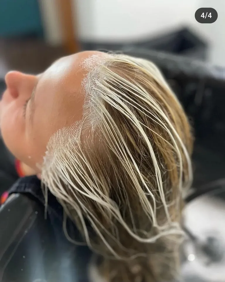 Hand-painted blonde highlights in process at Dockside Salon in Muskegon, MI