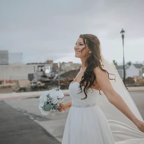 Bridal hair and makeup outdoors near Muskegon lakeshore by Dockside Salon